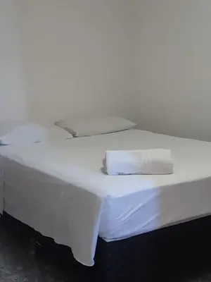 Uma cama ou camas num quarto em Hotel Flat Atlântico, Apartamento Com 02 Quartos
