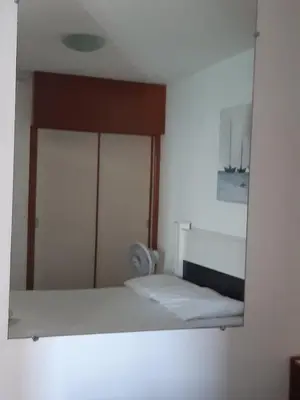 Uma cama ou camas num quarto em Hotel Flat Atlântico, Apartamento Com 02 Quartos