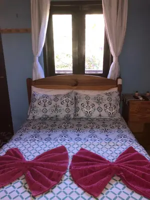 Uma cama ou camas num quarto em Casa YeS Jeri