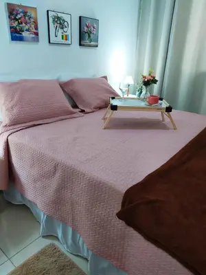 Uma cama ou camas num quarto em Vila Mulungu Flats