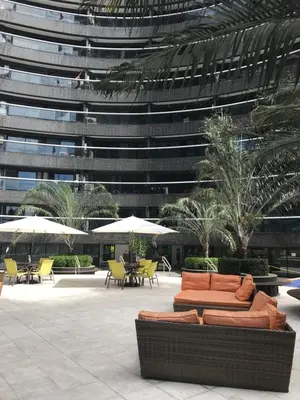 Um jardim no exterior de Flat Beira-Mar Landscape