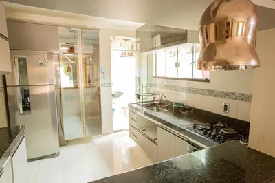 A cozinha ou kitchenette de Porto das Dunas Casa Temporada Estilo e Conforto