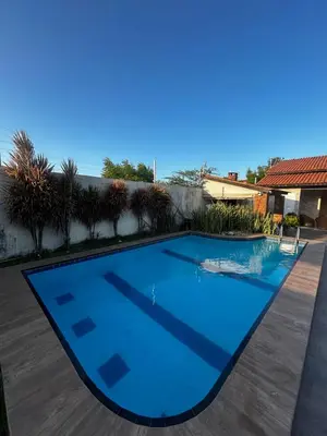 A piscina em ou perto de Porto das Dunas Casa Temporada Estilo e Conforto