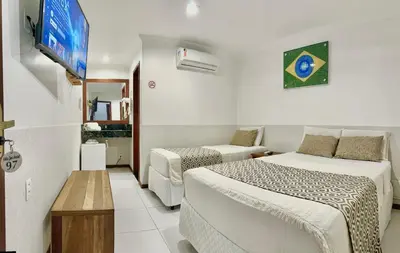 Uma cama ou camas num quarto em Rede Andrade Vila Jeri