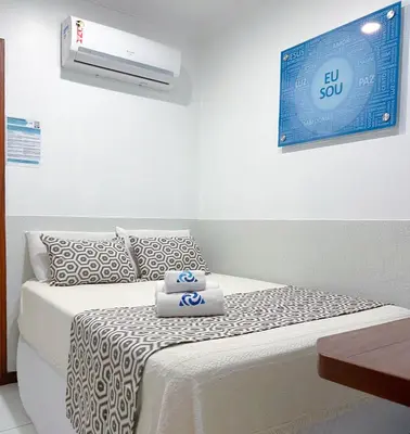 Uma cama ou camas num quarto em Rede Andrade Vila Jeri