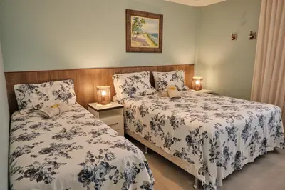 Uma cama ou camas num quarto em TERRAMARIS - APARTAMENTO PÉ NA AREIA