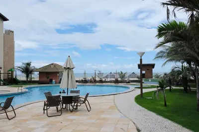 A piscina em ou perto de TERRAMARIS - APARTAMENTO PÉ NA AREIA