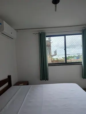 Uma cama ou camas num quarto em Apto privado 4º andar no Edifício residencial Náutico