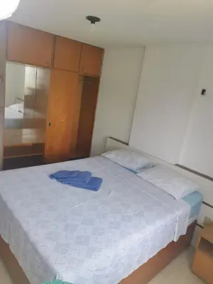 Uma cama ou camas num quarto em Apto privado 4º andar no Edifício residencial Náutico