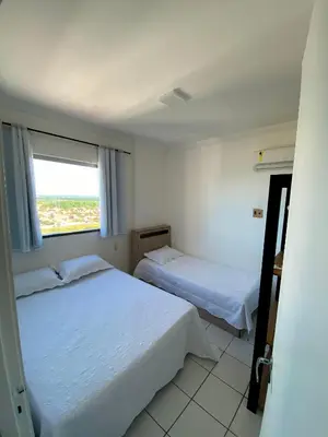 Uma cama ou camas num quarto em Apto Vista Beira Mar - Praia do Futuro a 100 mt da Praia