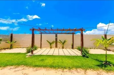 Um jardim no exterior de Apto Vista Beira Mar - Praia do Futuro a 100 mt da Praia