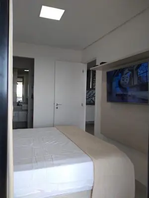 Uma cama ou camas num quarto em Alugo Temporada apartamento frente ao mar de Fortaleza vista panorâmica do Mar
