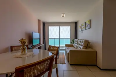 Uma área de estar em Modern Beachfront Apartment w. Magnificent Seaview
