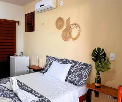Uma cama ou camas num quarto em Pousada Areias de Flecheiras