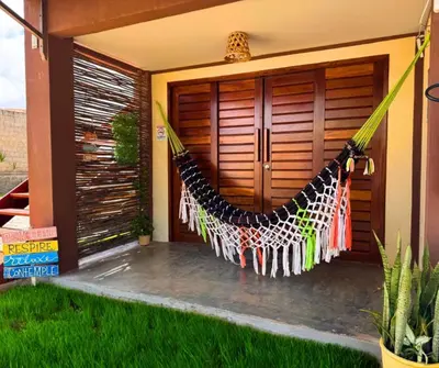 Um jardim no exterior de Pousada Areias de Flecheiras