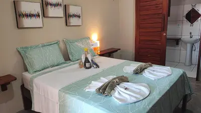 Uma cama ou camas num quarto em Pousada Areias de Flecheiras