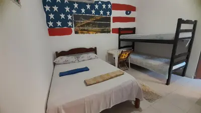 Uma cama ou camas num quarto em Pousada Subindo as Dunas