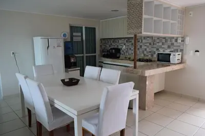 A cozinha ou kitchenette de VIP Beira Mar Residence