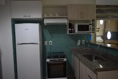 A cozinha ou kitchenette de VIP Beira Mar Residence