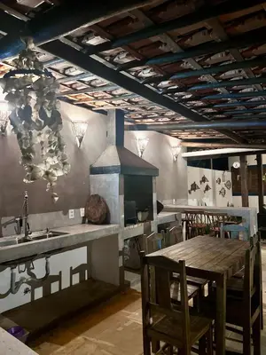 Um restaurante ou outro lugar para comer em Manay Lagoa do Paraíso, casa 2 quartos na beira da Lagoa
