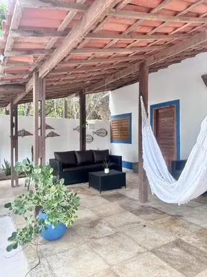 Uma área de estar em Manay Lagoa do Paraíso, casa 2 quartos na beira da Lagoa