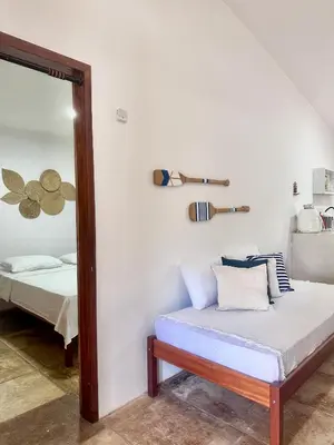 Uma cama ou camas num quarto em Manay Lagoa do Paraíso, casa 2 quartos na beira da Lagoa