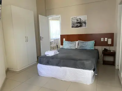 Uma cama ou camas num quarto em Golden Fortaleza Beira Mar