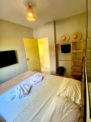 Uma cama ou camas num quarto em Chalés Amarante