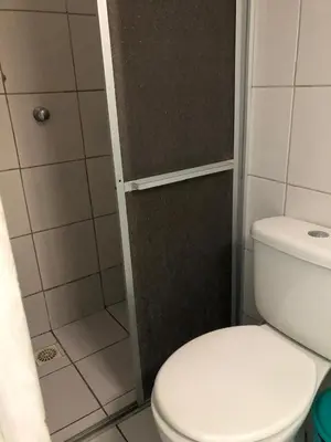 Uma casa de banho em Hotel Oiticica