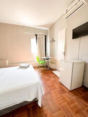 Uma cama ou camas num quarto em Hotel Oiticica