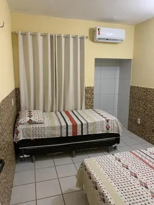 Uma cama ou camas num quarto em Flat Crystal Park Porto das Dunas- Cristal park