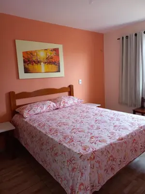 Uma cama ou camas num quarto em Apartamento Mobiliado Vila Iracema