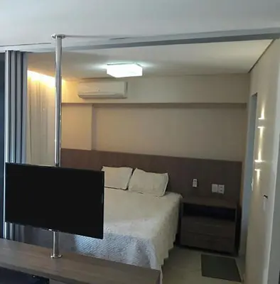 Uma cama ou camas num quarto em Apto à beira-mar com wi-fi e piscina em Fortaleza
