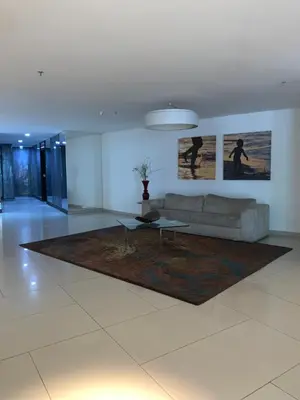 Uma área de estar em LANDSCAPE BEIRA MAR - FLAT MODERNO E CONFORTAVEL FORTALEZA Meireles