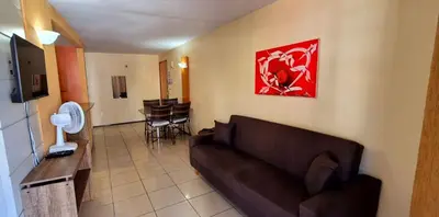 Uma televisão e/ou sistema de entretenimento em Flat da Claudia