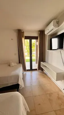 Uma cama ou camas num quarto em Taiba Beach Resort