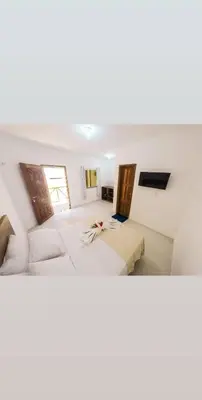 Uma cama ou camas num quarto em Chalés Pulo do Gato