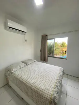Uma cama ou camas num quarto em Apartamento Taiba!