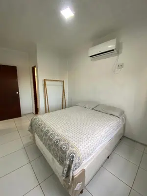 Uma cama ou camas num quarto em Apartamento Taiba!