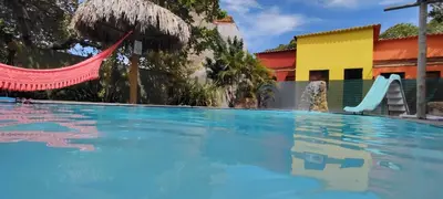 A piscina em ou perto de Chalés da Cris