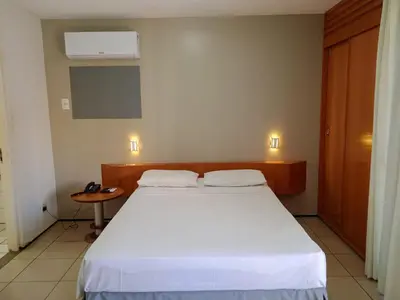 Uma cama ou camas num quarto em Praia Mansa -PM - RP