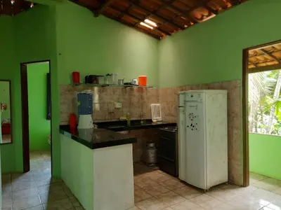A cozinha ou kitchenette de Chalé Verdelândia Guaramiranga - Casas com 2, 3 e 4 quartos