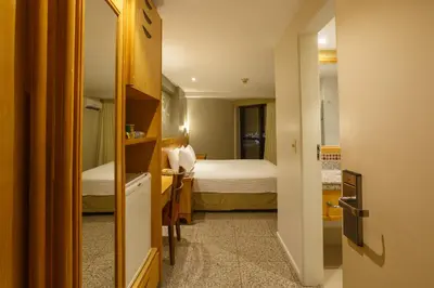 Uma cama ou camas num quarto em Blue Tree Towers Fortaleza Beira Mar