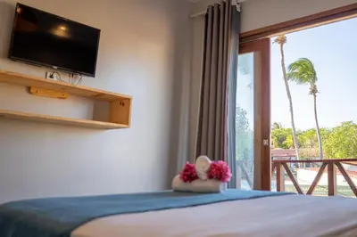 Uma cama ou camas num quarto em Pousada Cactus Jeri