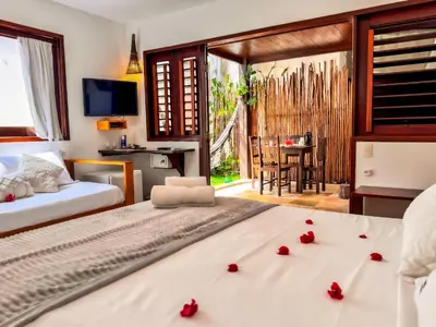 Uma cama ou camas num quarto em AKY JERI - POUSADA Vila de Jericoacoara