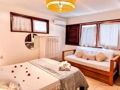 Uma cama ou camas num quarto em AKY JERI - POUSADA Vila de Jericoacoara