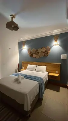 Uma cama ou camas num quarto em Pousada Recreio Casa Grande