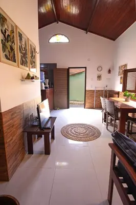 Uma área de estar em Casinha Canoa - Casa Com Ar-Condicionados e Localização Perfeita