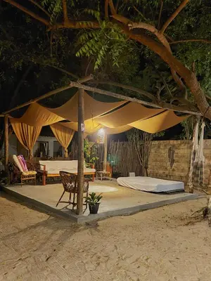 Um pátio ou outra área exterior em Casa IURUKUA-bangalos com ou sem cozinha, perto da praia e cercados pela natureza