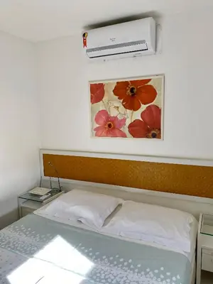 Uma cama ou camas num quarto em Cumbuco Dream Village Beachfront 3 Quartos
